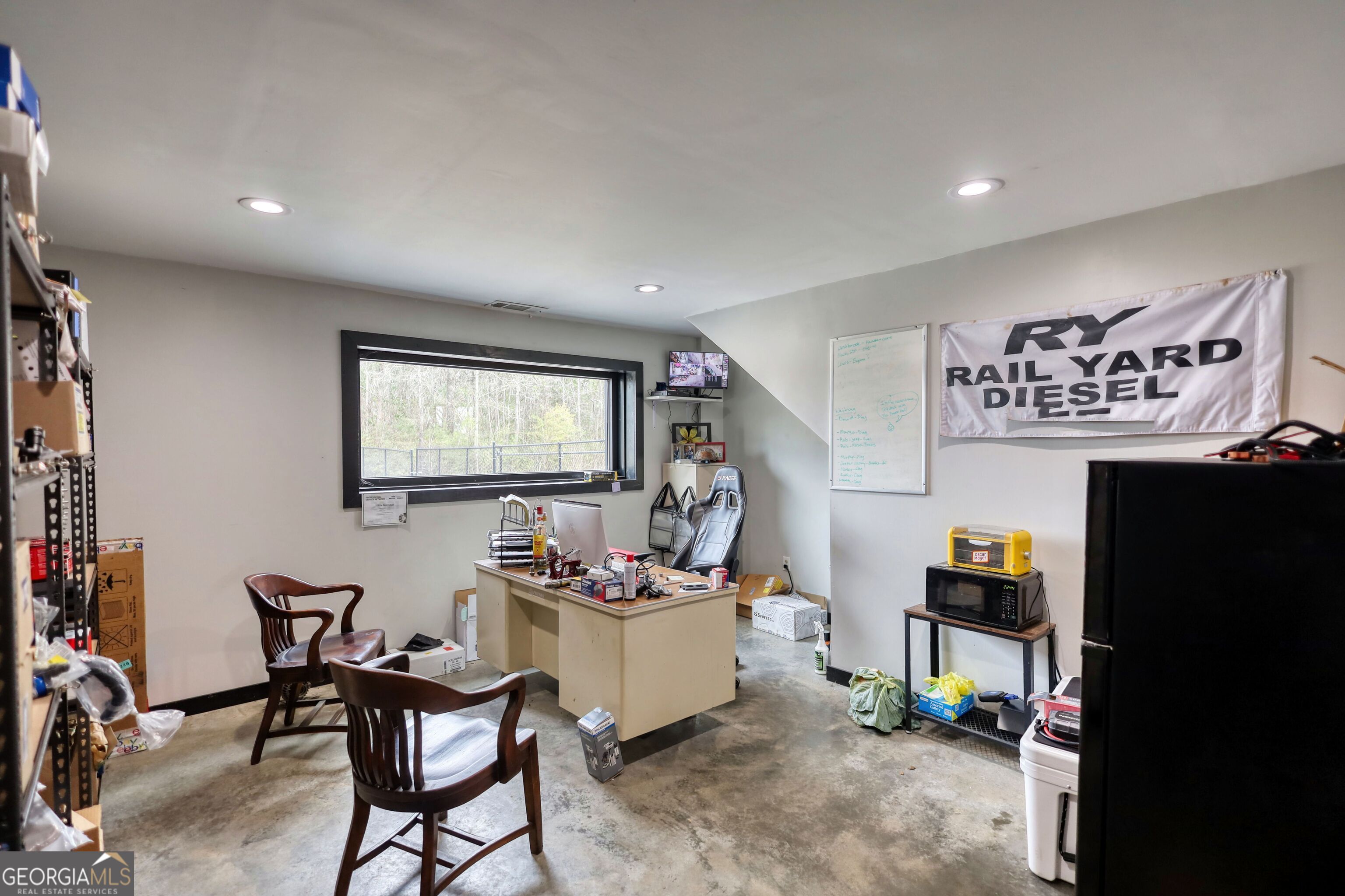 200 Railroad Street Monticello, GA 31064 - Photo 10 of 45 a workspace with furniture and window