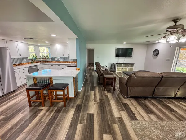 a living room with furniture and a table