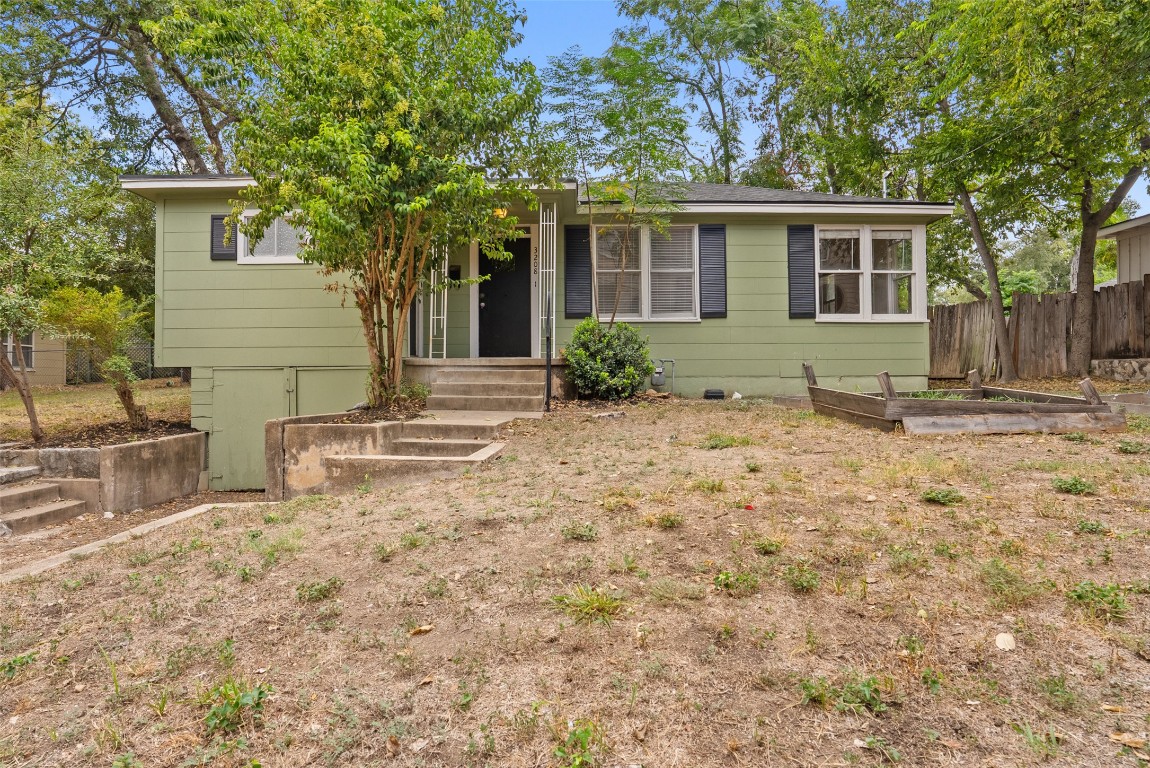 3208 Duval Street Austin, TX 78705 - Photo 18 of 26 a view of a house with backyard and sitting area