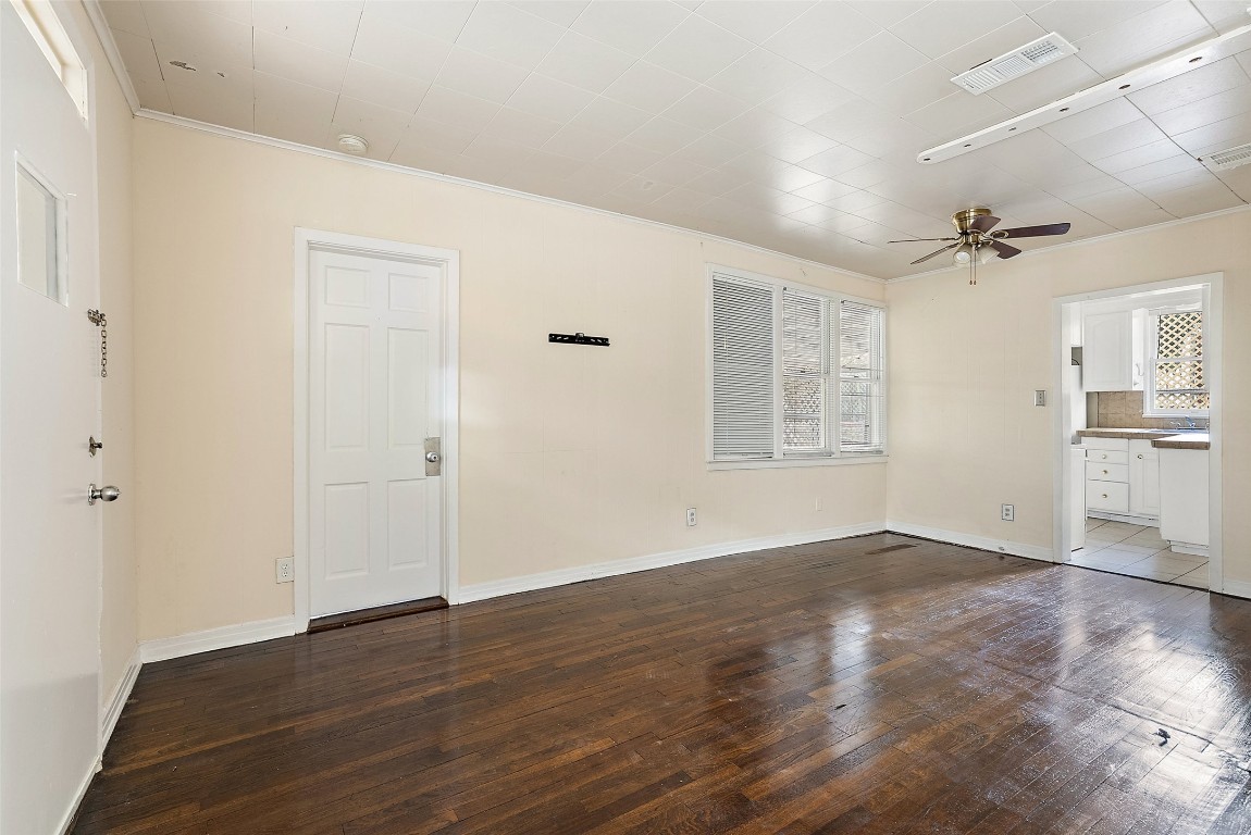 3208 Duval Street Austin, TX 78705 - Photo 22 of 26 wooden floor in an empty room with a window