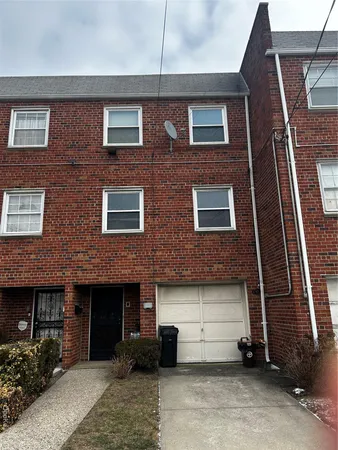 a building view with a brick wall