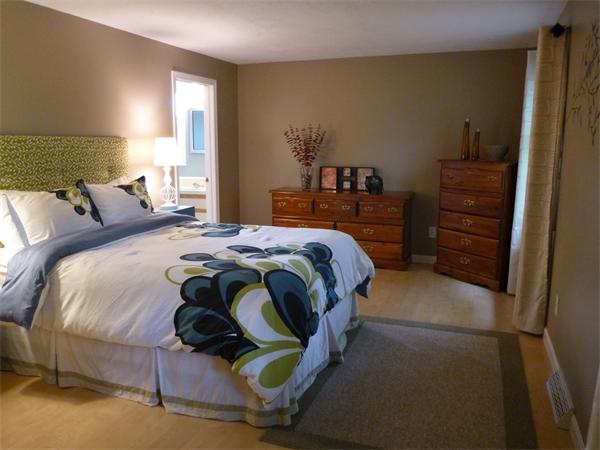 119 Orton Street Extension Worcester, MA 01604 - Photo 16 of 29 a bedroom with a bed and a dresser
