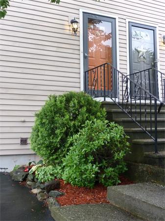 119 Orton Street Extension Worcester, MA 01604 - Photo 2 of 29 a view of a house with a yard