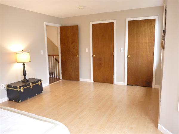 119 Orton Street Extension Worcester, MA 01604 - Photo 21 of 29 a bedroom with a bed and a table