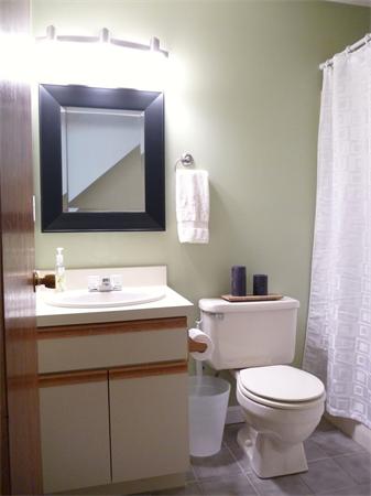 119 Orton Street Extension Worcester, MA 01604 - Photo 22 of 29 a bathroom with a toilet sink and mirror