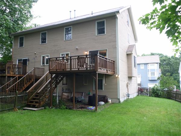 119 Orton Street Extension Worcester, MA 01604 - Photo 29 of 29 a front view of a house with a garden