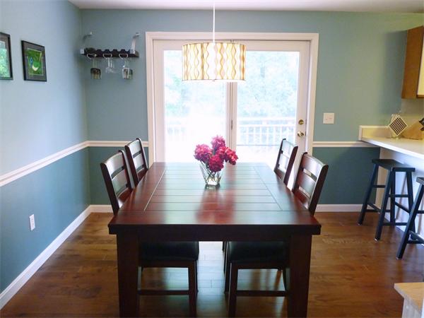 119 Orton Street Extension Worcester, MA 01604 - Photo 9 of 29 a view of a dining room with furniture window and wooden floor