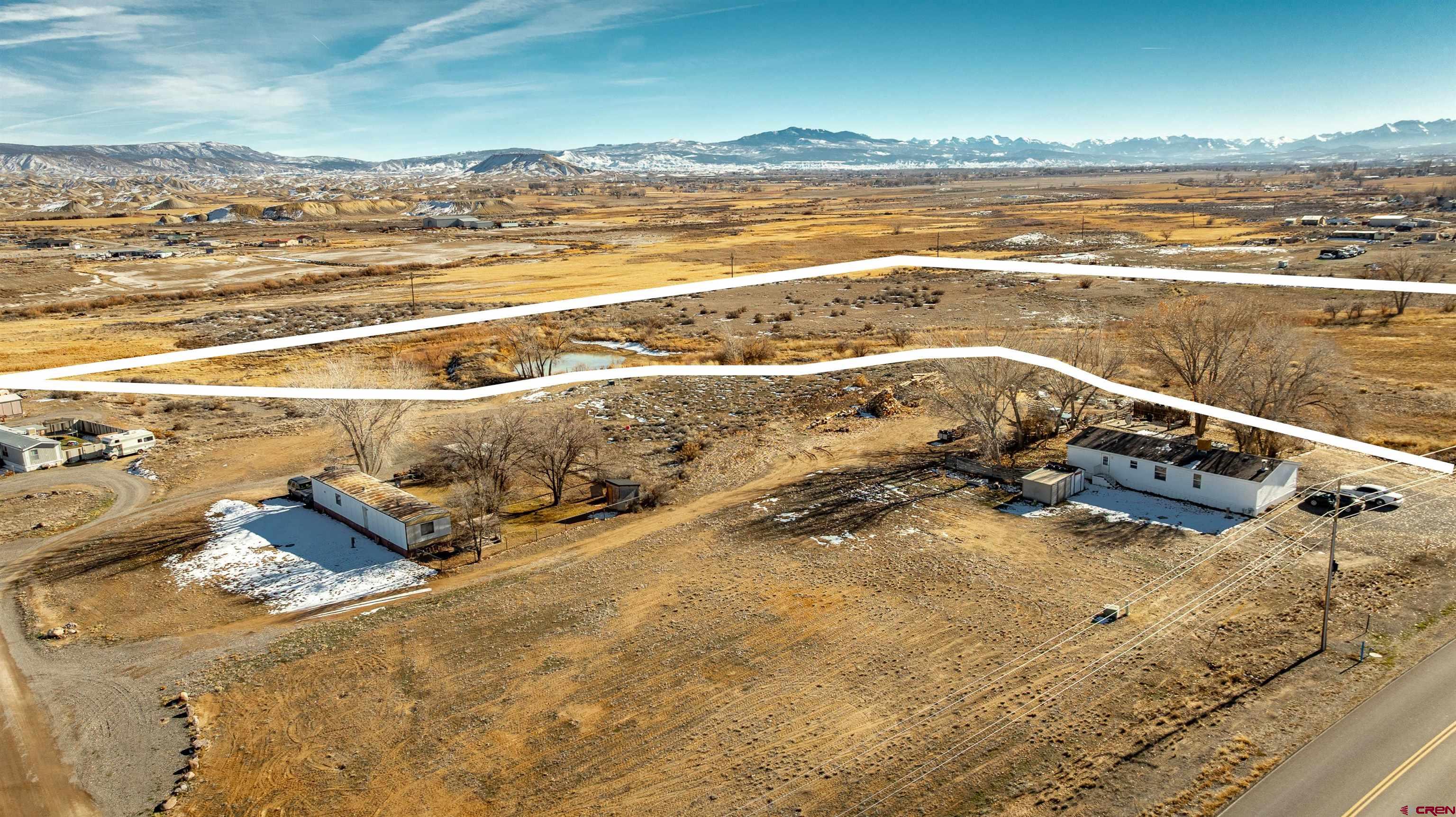 Lot 1 Jade Road Montrose, CO 81401 - Photo 22 of 25 a view of an ocean and a building