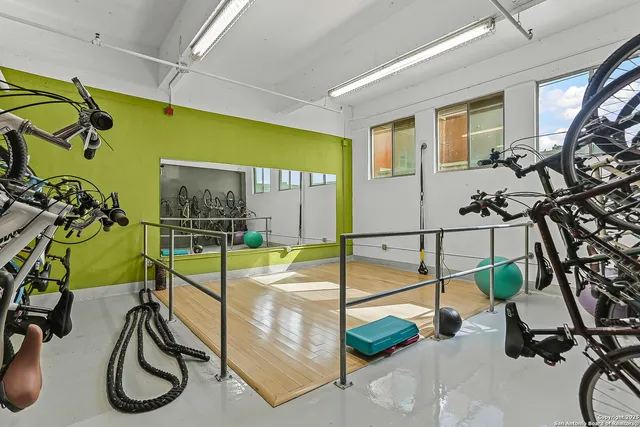 a view of a room with gym equipment