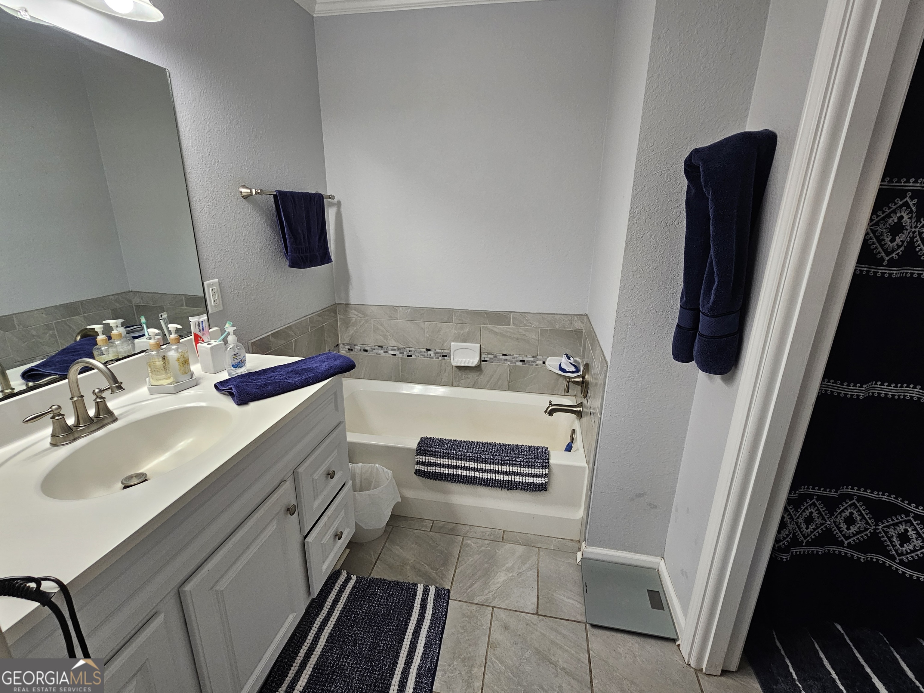 1853 Highway 441 Dublin, GA 31021 - Photo 12 of 28 a bathroom with a sink and a mirror