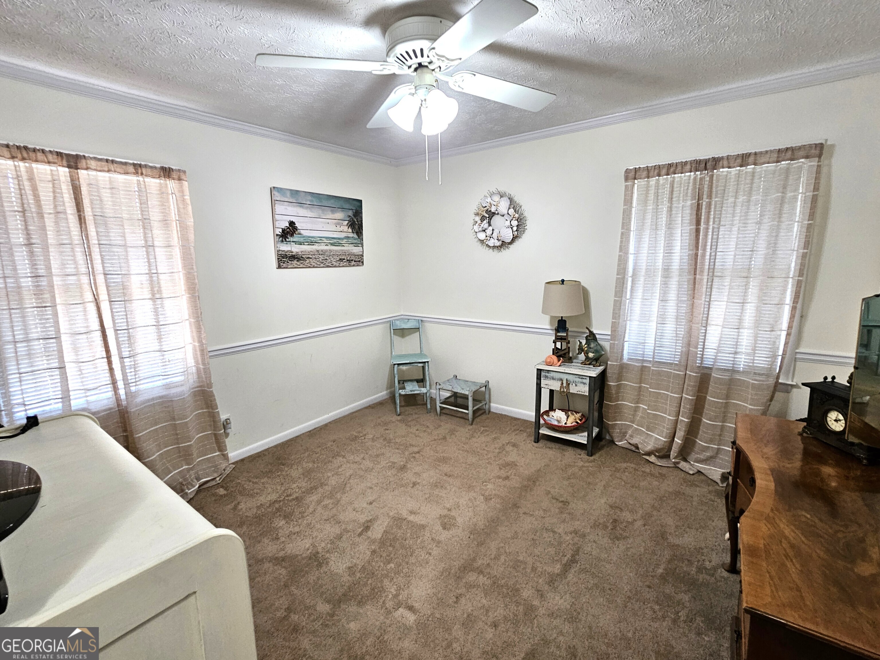 1853 Highway 441 Dublin, GA 31021 - Photo 19 of 28 a living room with furniture and a flat screen tv