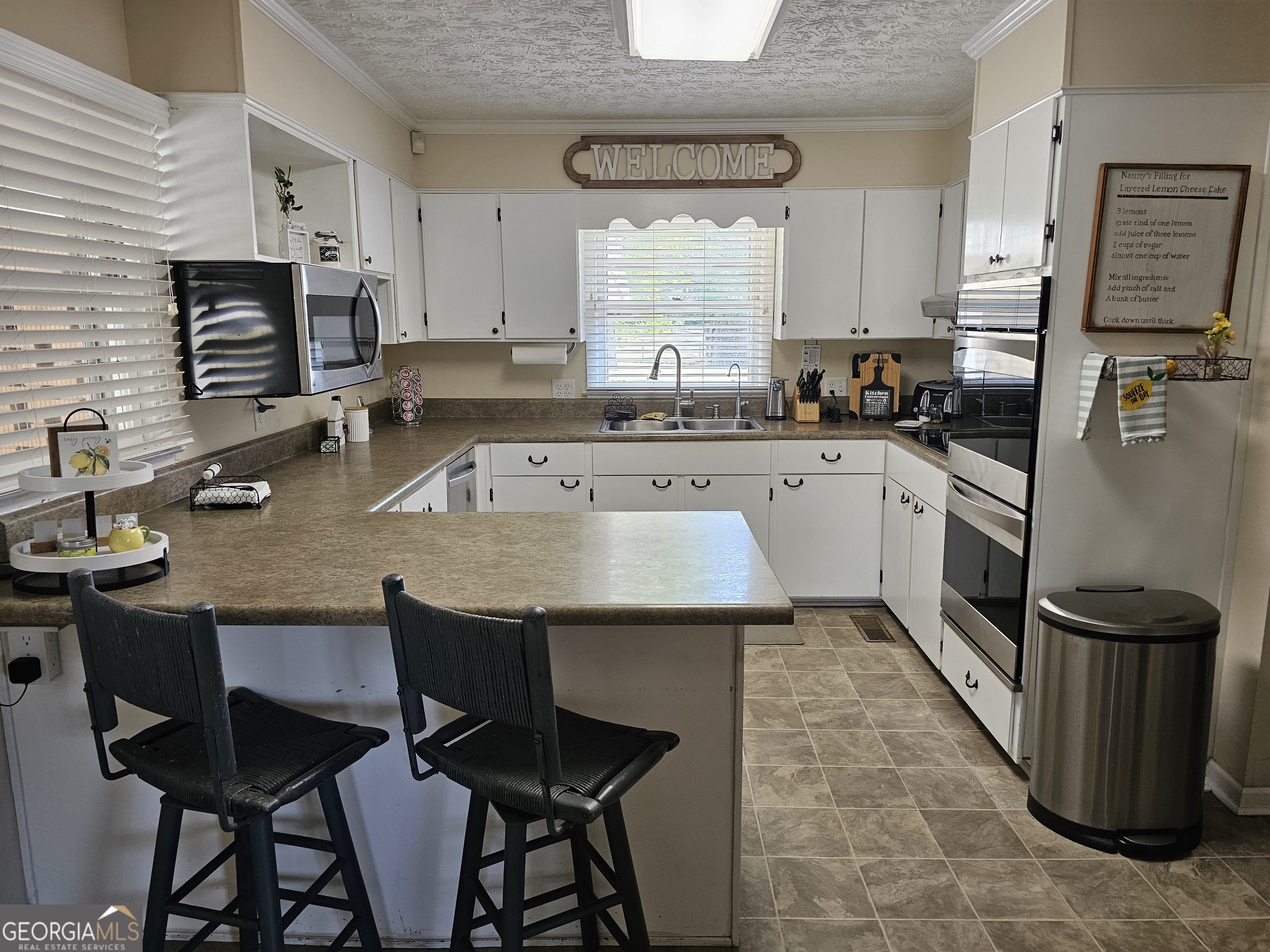 1853 Highway 441 Dublin, GA 31021 - Photo 6 of 28 a kitchen with a sink appliances and cabinets