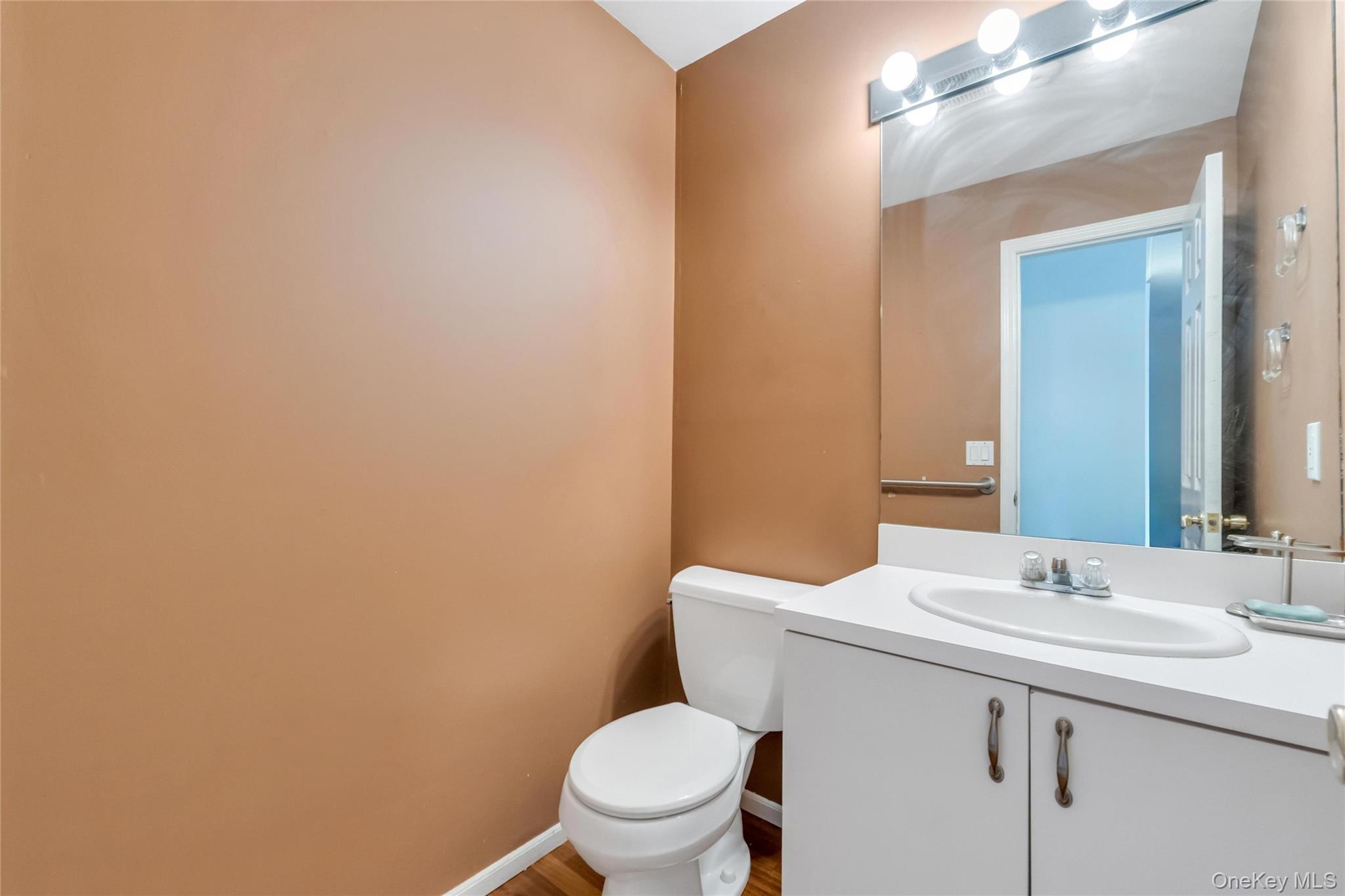 22 Kettle Hole Road Manorville, NY 11949 - Photo 18 of 39 Downstairs 1/2 Bathroom