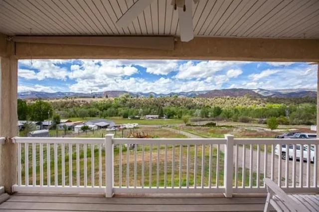 a aerial view of a house with a yard