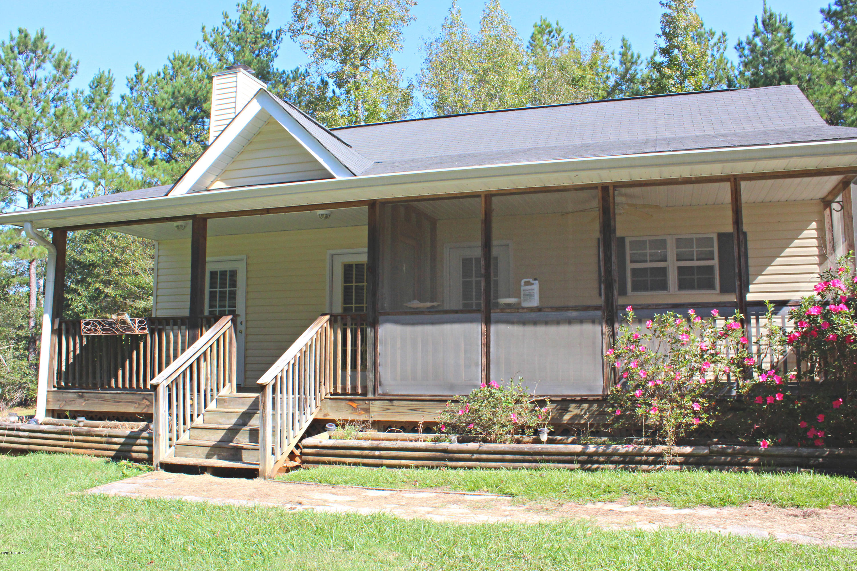 1888 Boxankle Road Forsyth, GA 31029 - Photo 1 of 6 a front view of a house with a yard