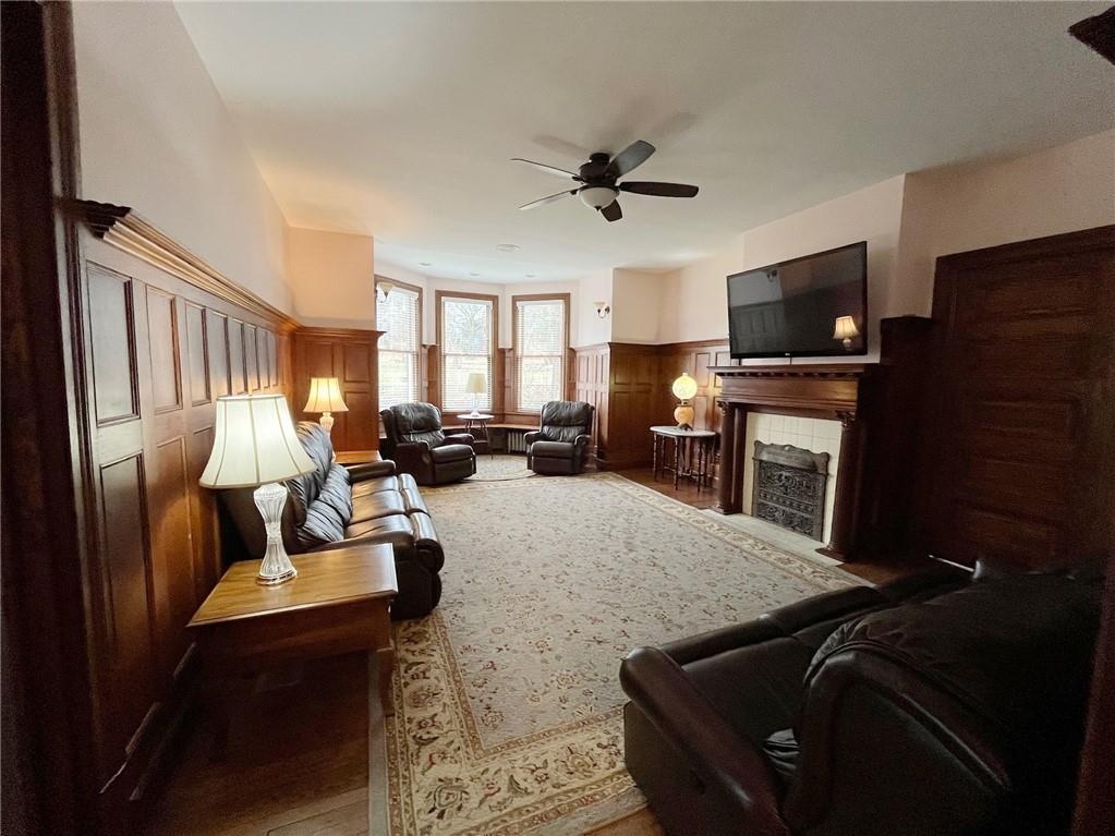 403 Laughlin Street Dawson, PA 15428 - Photo 11 of 39 a living room with furniture and a flat screen tv