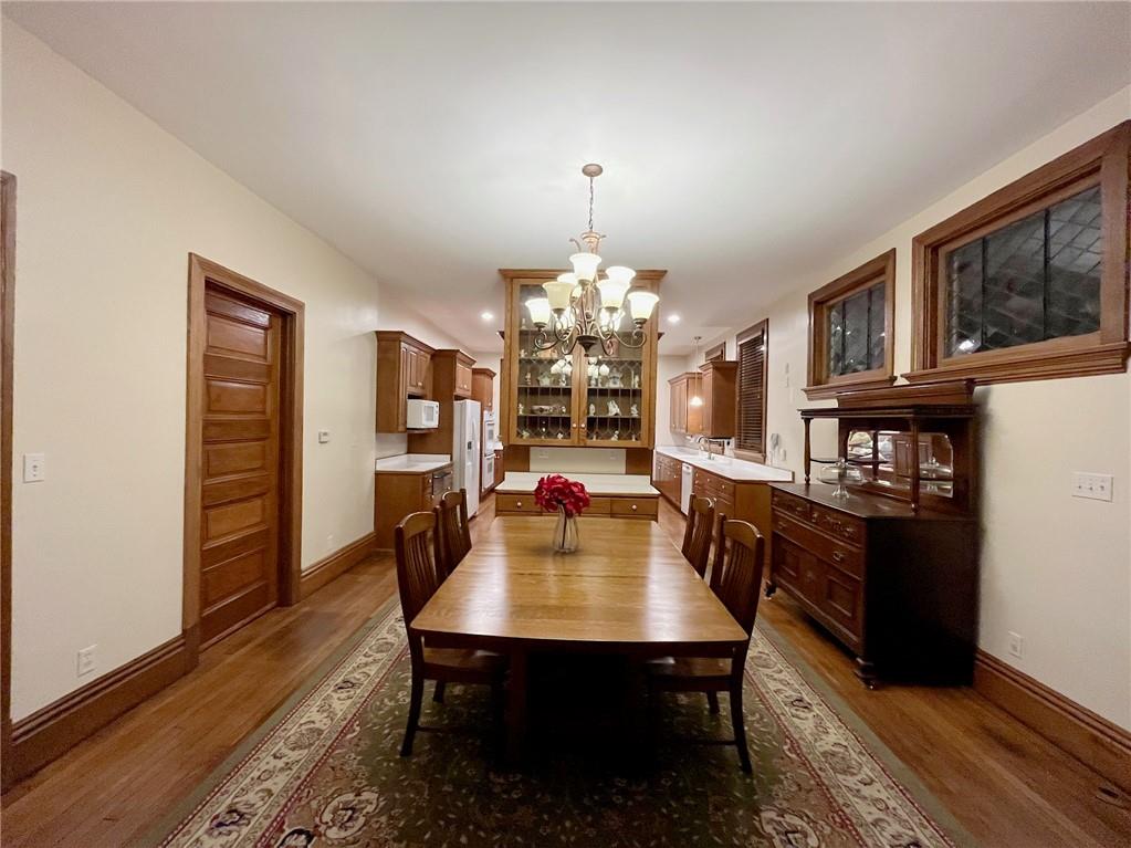403 Laughlin Street Dawson, PA 15428 - Photo 16 of 39 a view of a dining room with furniture and chandelier