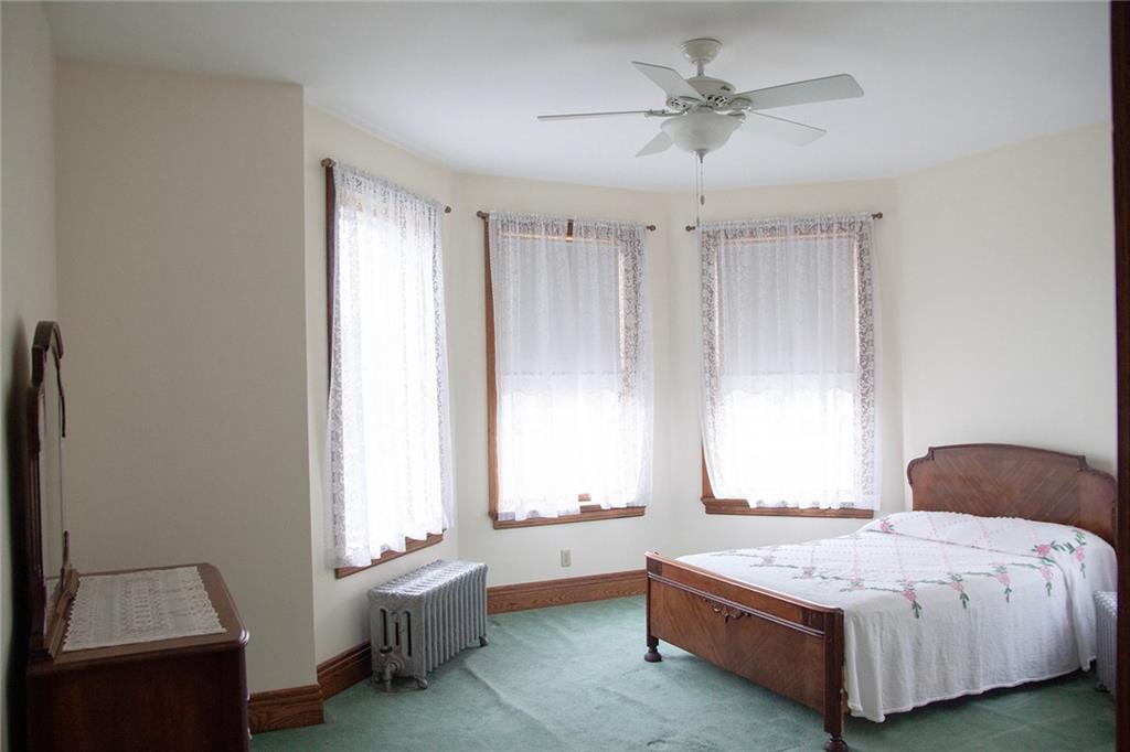 403 Laughlin Street Dawson, PA 15428 - Photo 27 of 39 a bedroom with a bed and a window