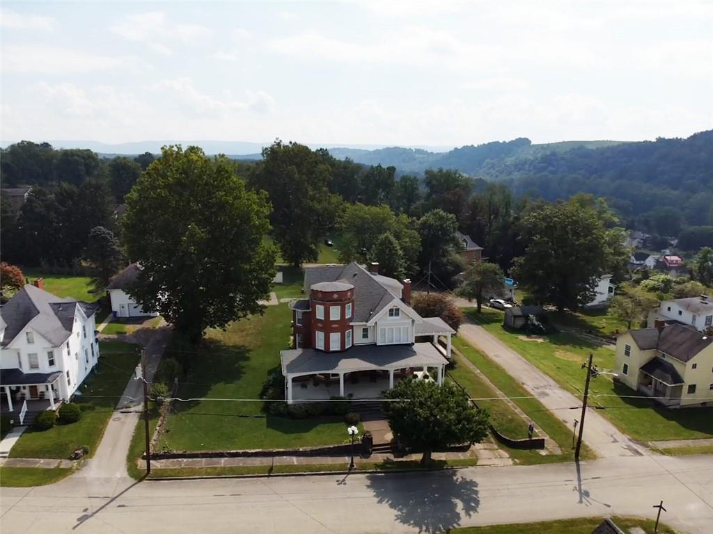 403 Laughlin Street Dawson, PA 15428 - Photo 36 of 39 an aerial view of a house with a garden