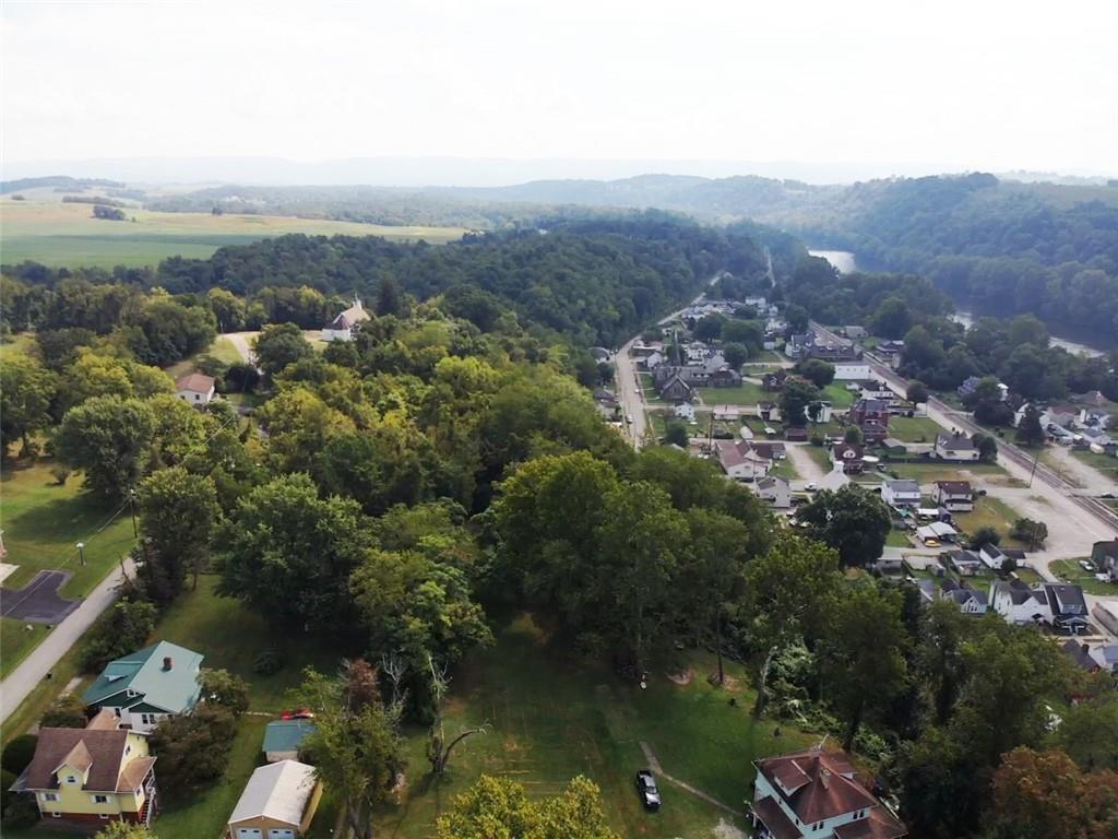 403 Laughlin Street Dawson, PA 15428 - Photo 39 of 39 an aerial view of a town with couple of houses