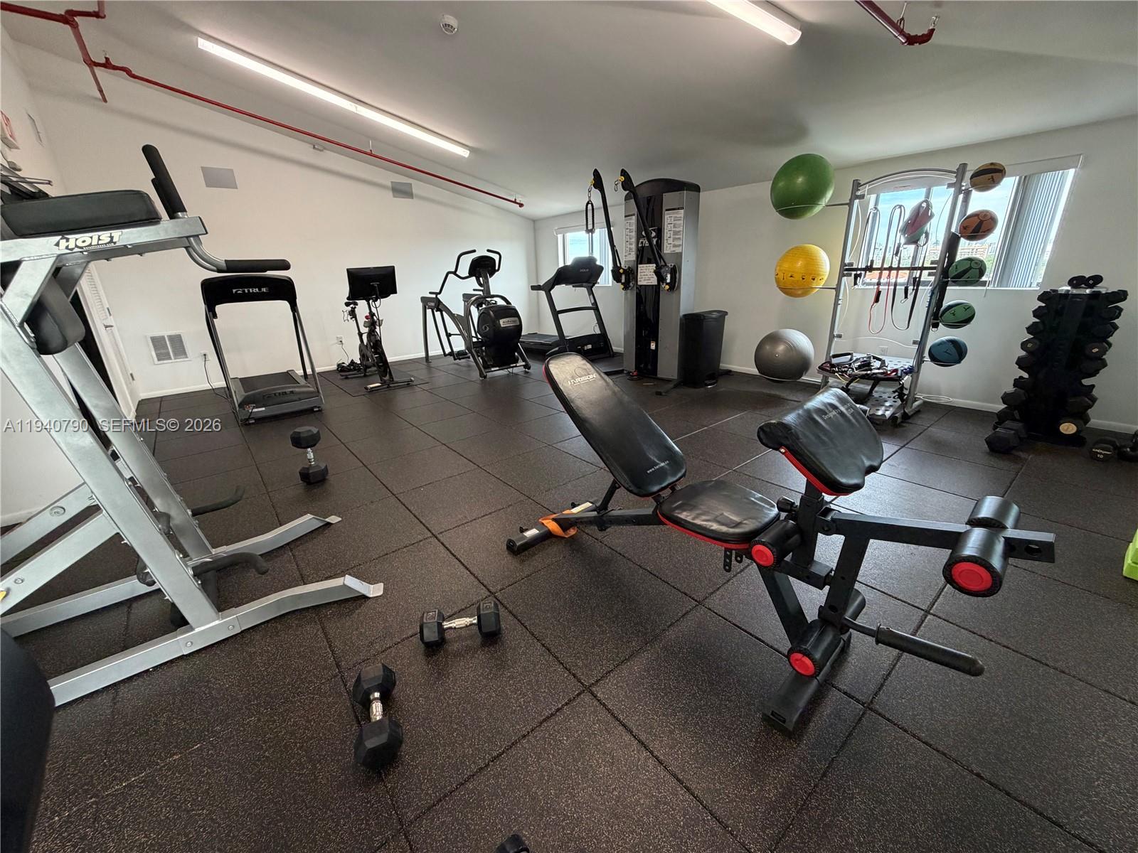 1801 Southwest 32nd Avenue, Unit 704 Miami, FL 33145 - Photo 18 of 18 a view of gym equipment