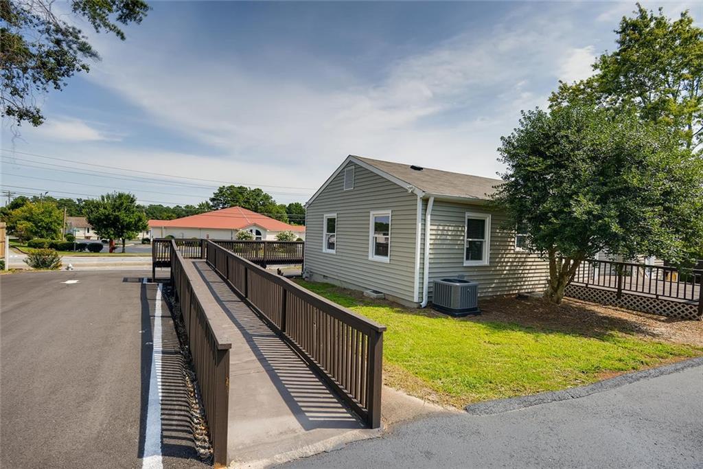 2158 Austell Road Southwest Marietta, GA 30008 - Photo 1 of 1 a view of a house with a patio