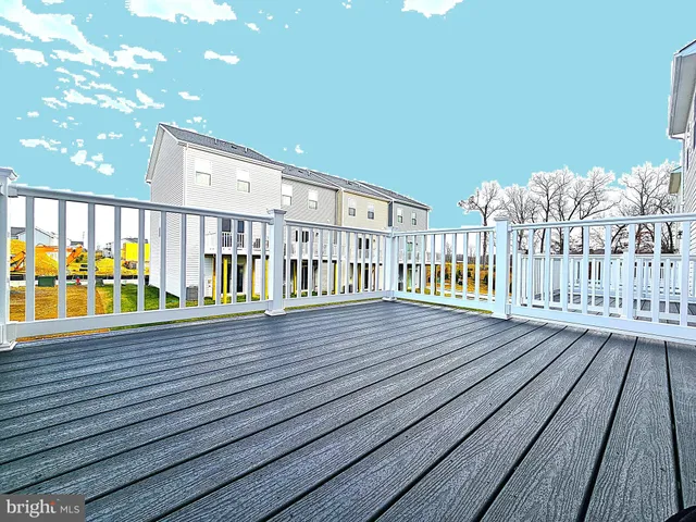 a view of a balcony with wooden floor