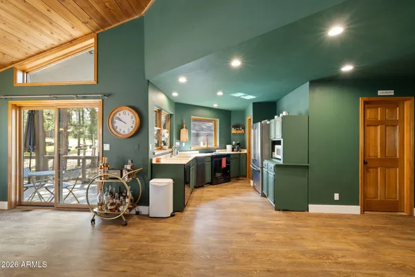 a view of a living room and dining room