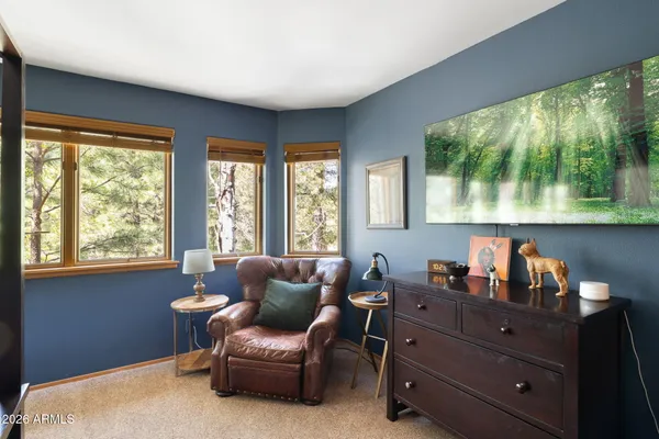 a room with furniture and a window