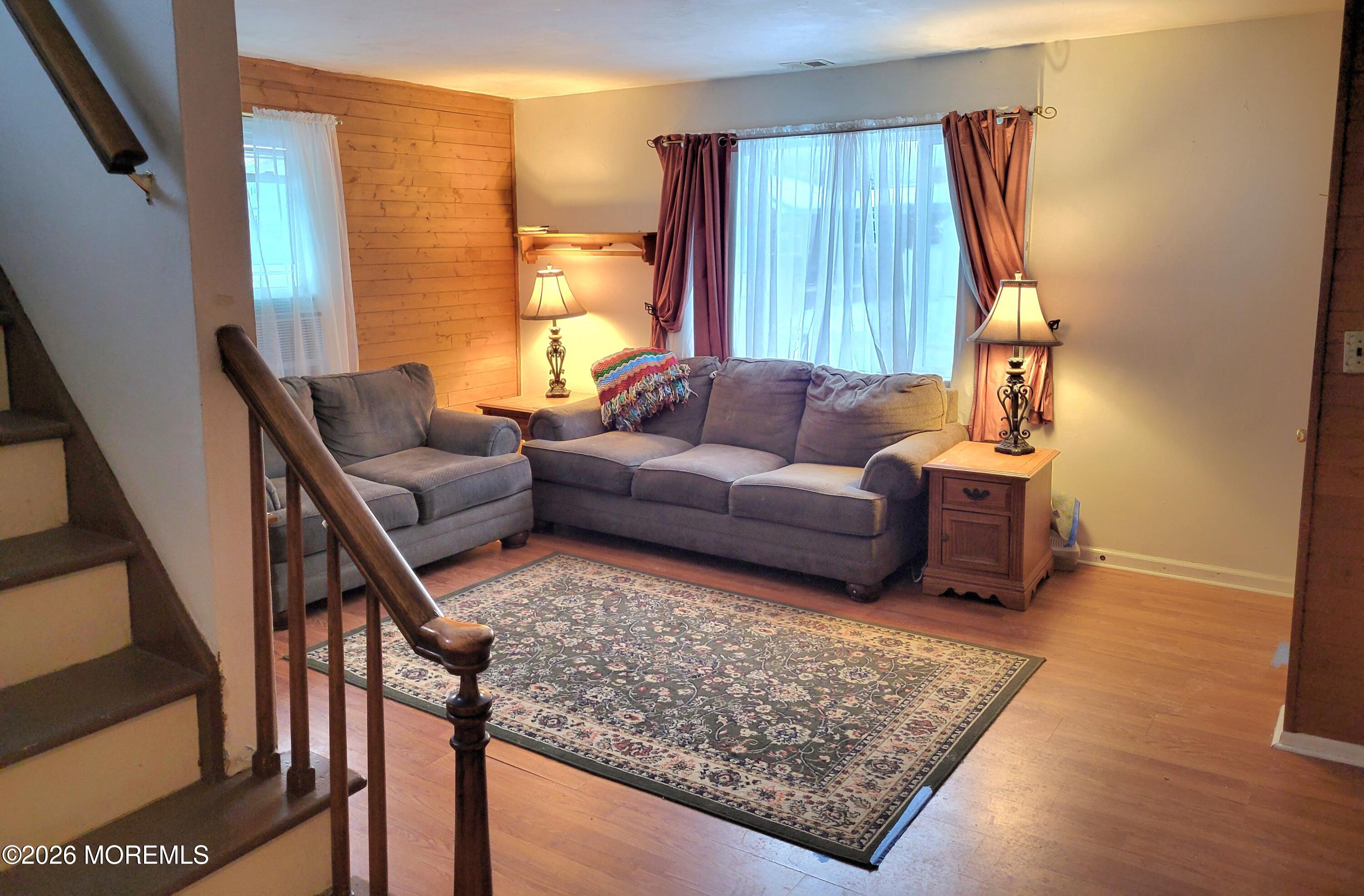 6 Octavia Place Keyport, NJ 07735 - Photo 3 of 9 a living room with furniture and a rug