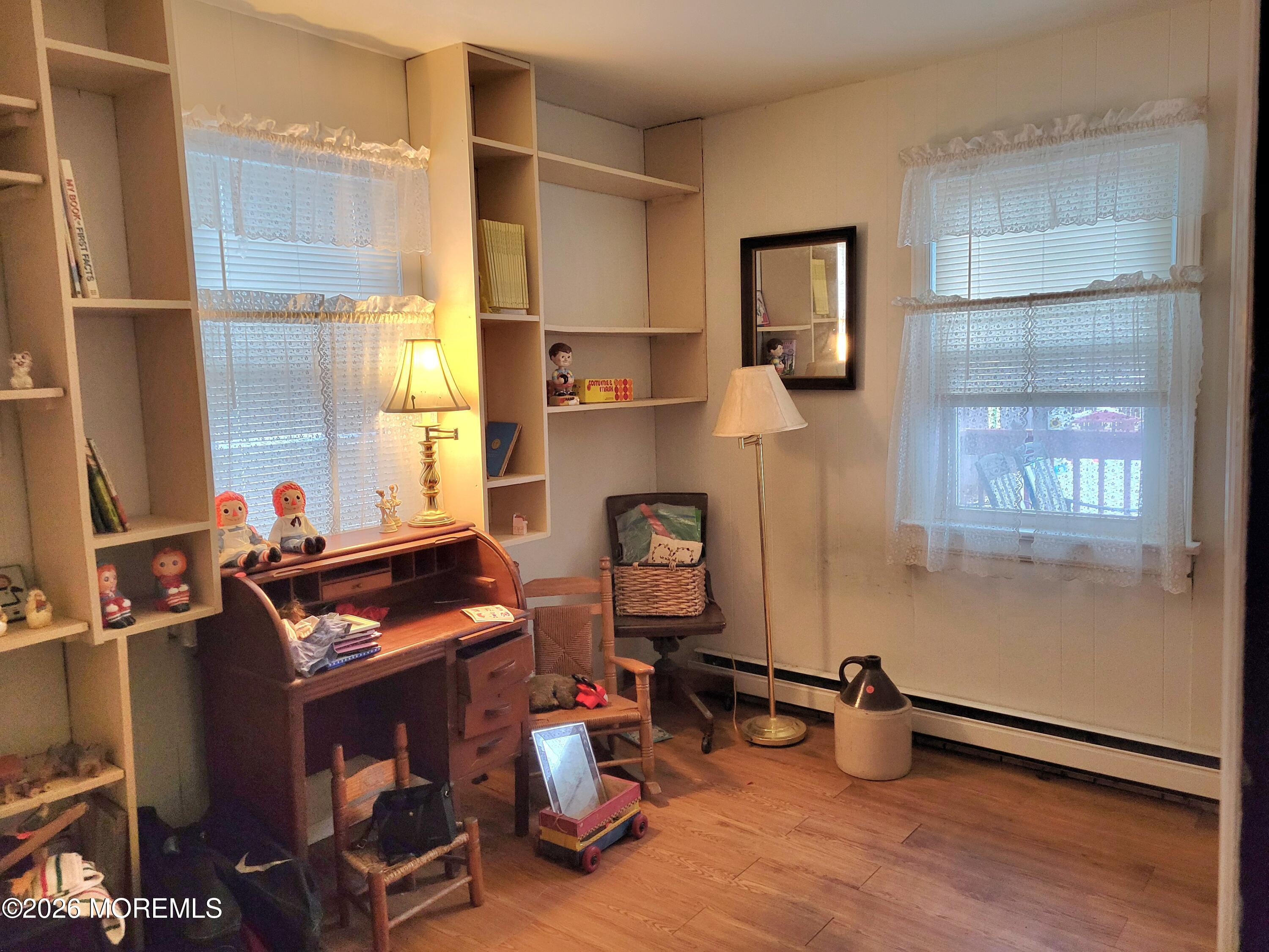 6 Octavia Place Keyport, NJ 07735 - Photo 6 of 9 a room with furniture and a fireplace