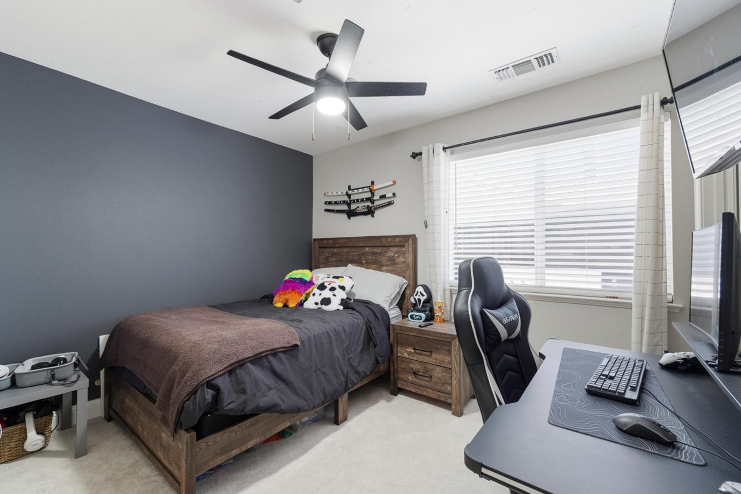 2220 Ellison Drive Modesto, CA 95355 - Photo 28 of 53 a bedroom with a bed and a desk