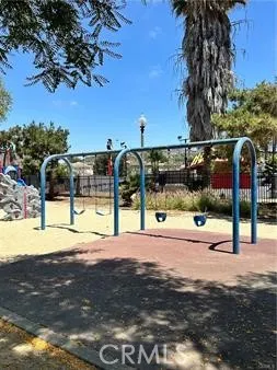 a view of a swimming pool with an outdoor seating