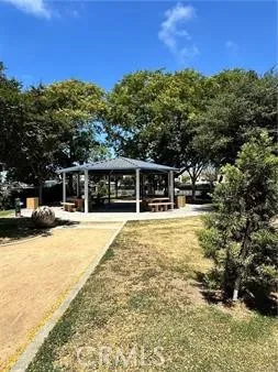 a balcony with trees in the background