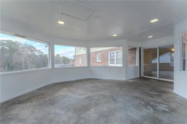 an empty room with windows