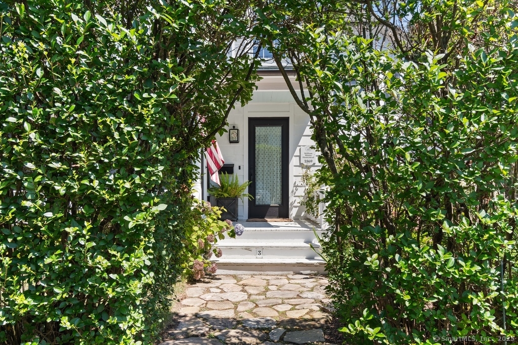3 Pond Street Norwalk, CT 06853 - Photo 1 of 1 a front view of a house with a yard and potted plants