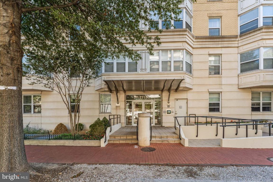 1111 11th Street Northwest, Unit 408 Washington, DC 20001 - Photo 1 of 21 front view of a building with a yard