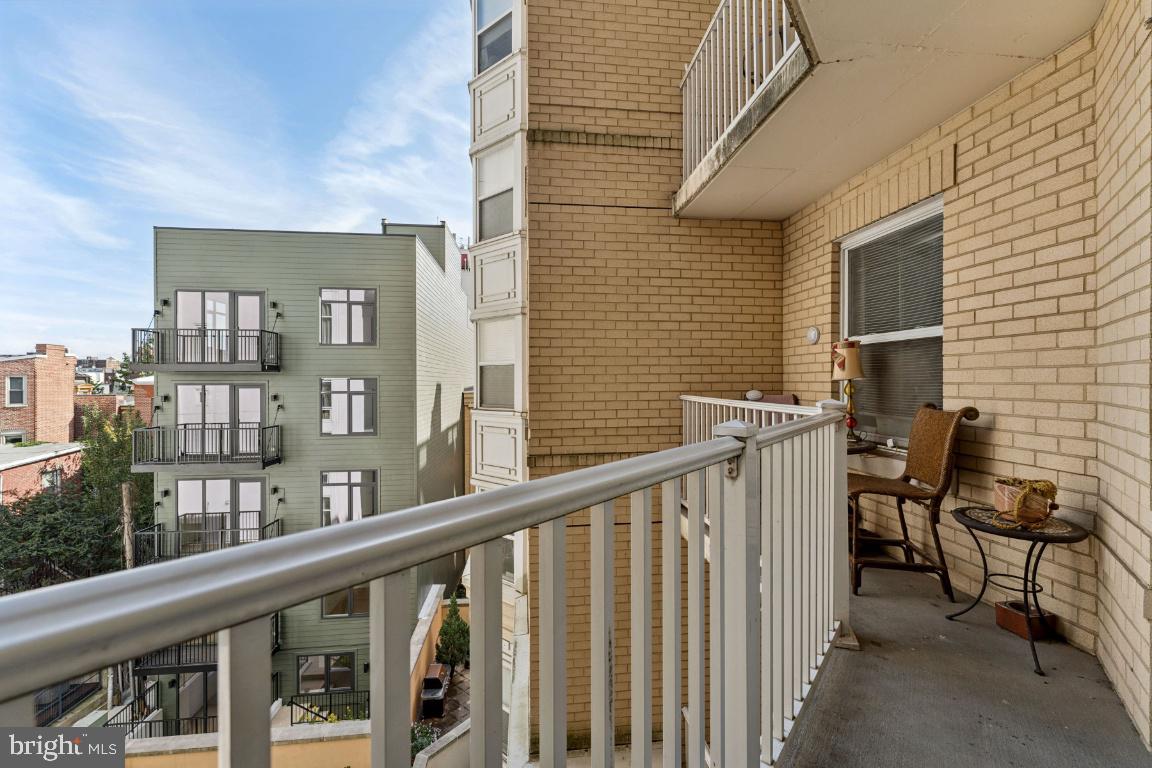 1111 11th Street Northwest, Unit 408 Washington, DC 20001 - Photo 15 of 21 a view of a balcony with furniture