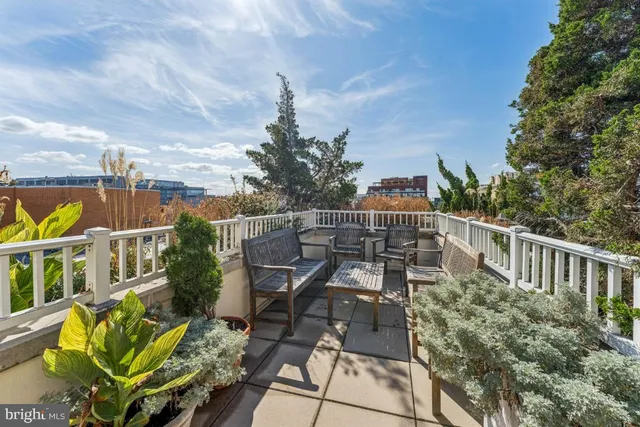 a view of a chairs and table on the terrace
