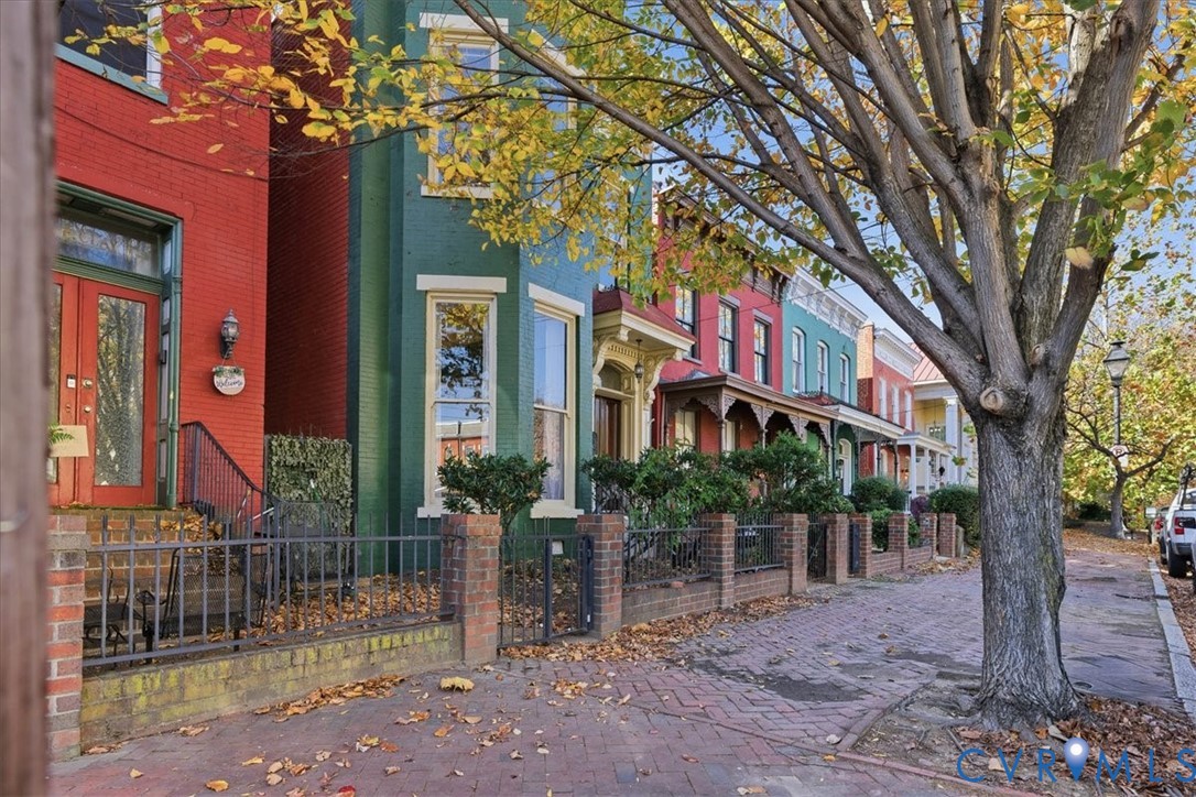 a view of a building with a tree