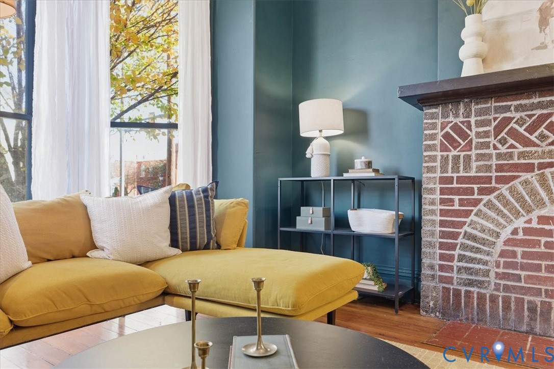 19 East Clay Street Richmond, VA 23219 - Photo 25 of 31 a living room with a couch and a table