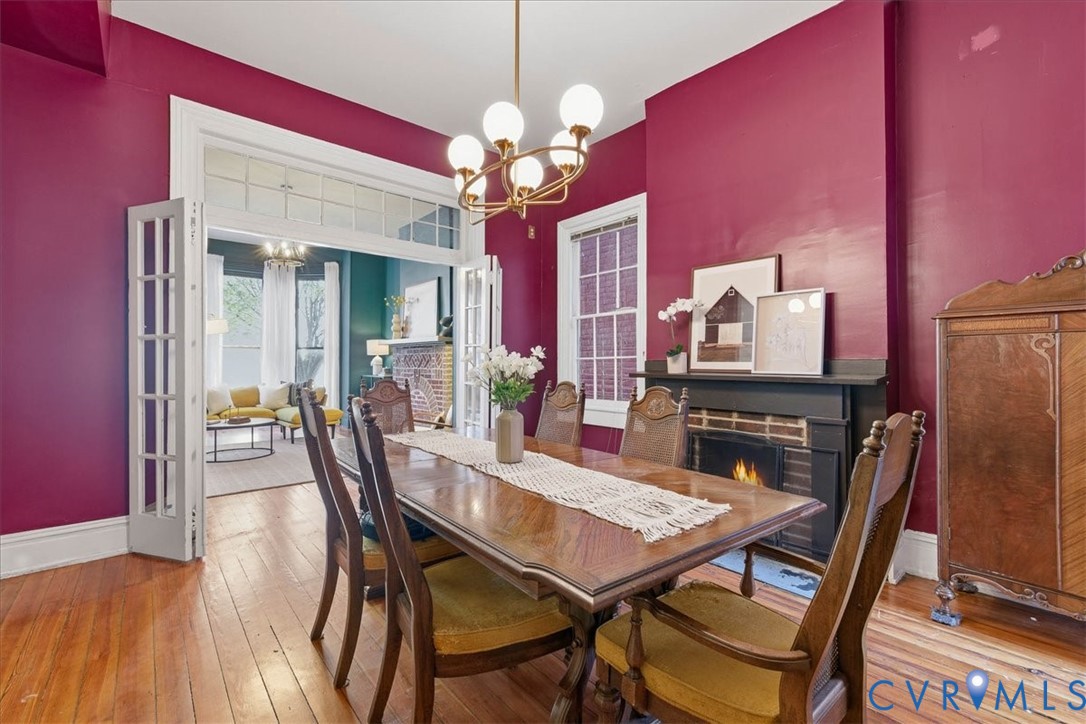 19 East Clay Street Richmond, VA 23219 - Photo 26 of 31 a view of a dining room with furniture and chandelier