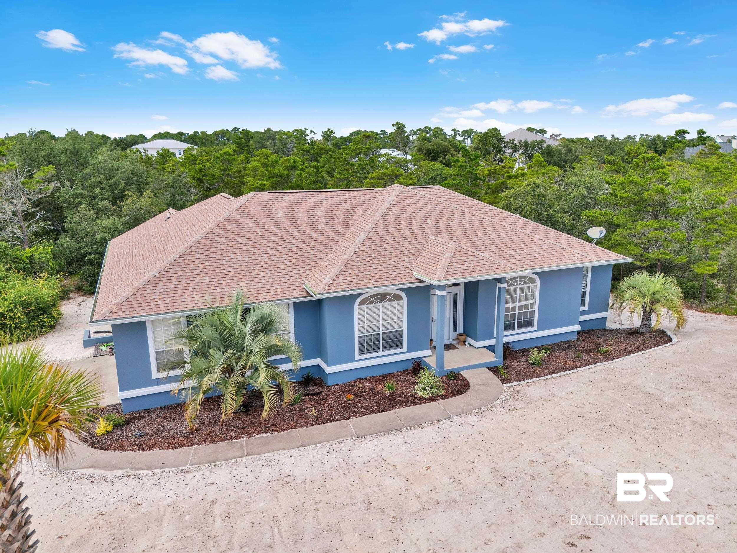 4606 Osprey Drive Orange Beach, AL 36561 - Photo 2 of 44 View of front of home featuring stucco siding and roof with shingles
