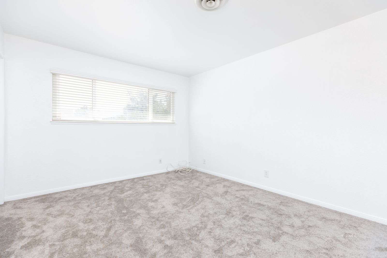 317 Mari Court Ridgecrest, CA 93555 - Photo 16 of 30 an empty room with a window
