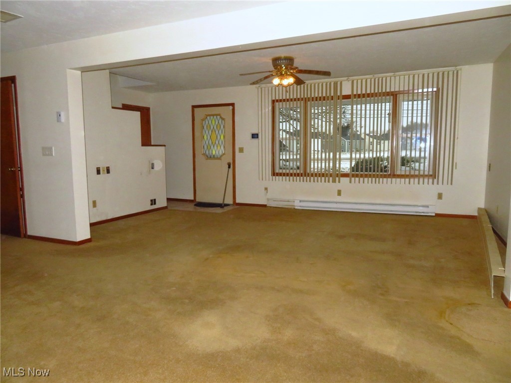38505 Sugar Ridge Road North Ridgeville, OH 44039 - Photo 8 of 44 A newer large Picture Window with double hung windows on each side illuminate the living room. The main living area is on the 2nd floor. As a FYI: No hardwood flooring exists under the carpeting, just subflooring.