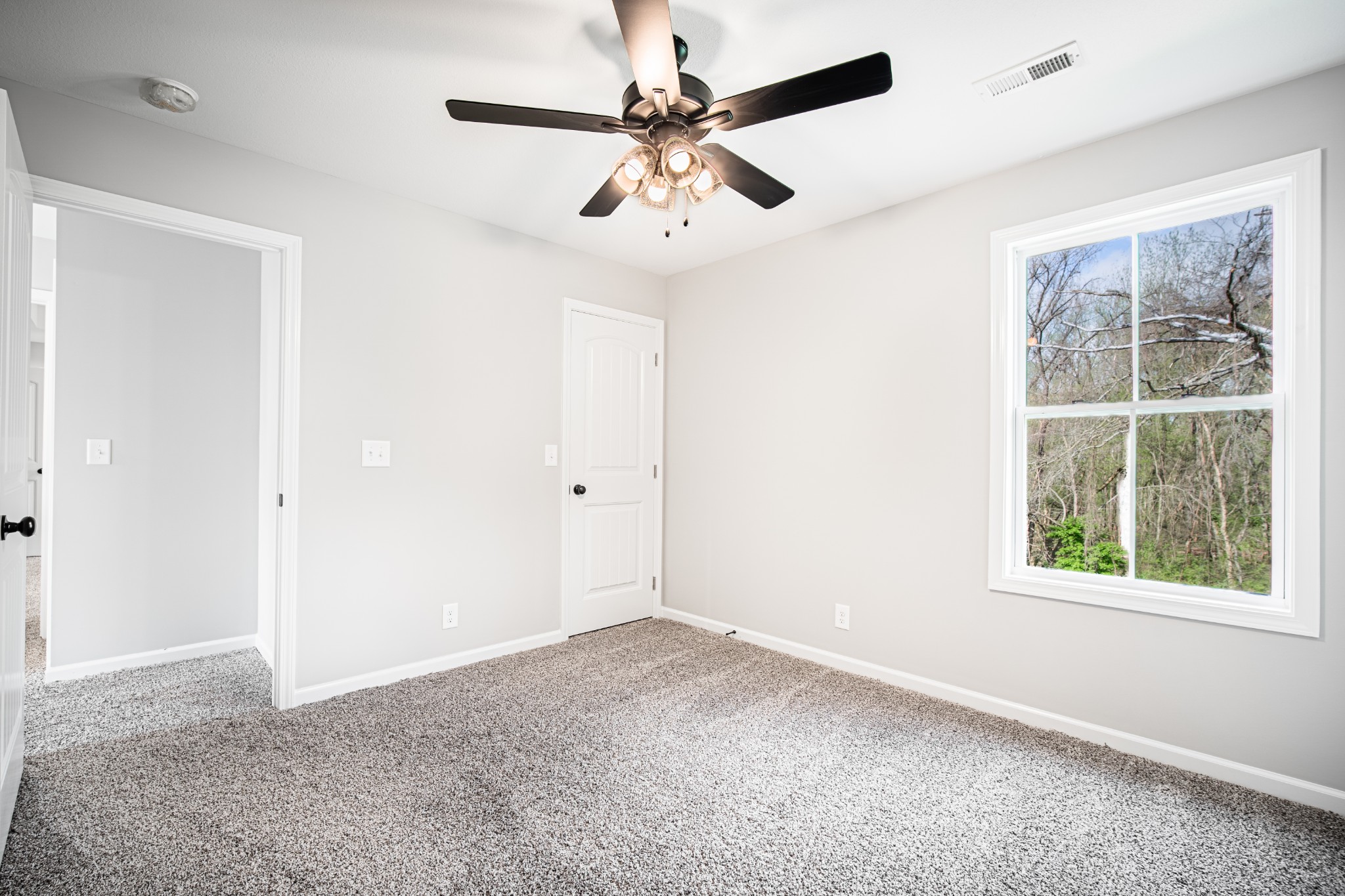 46 Bunker Hill Road Clarksville, TN 37042 - Photo 10 of 14 a view of an empty room with a window