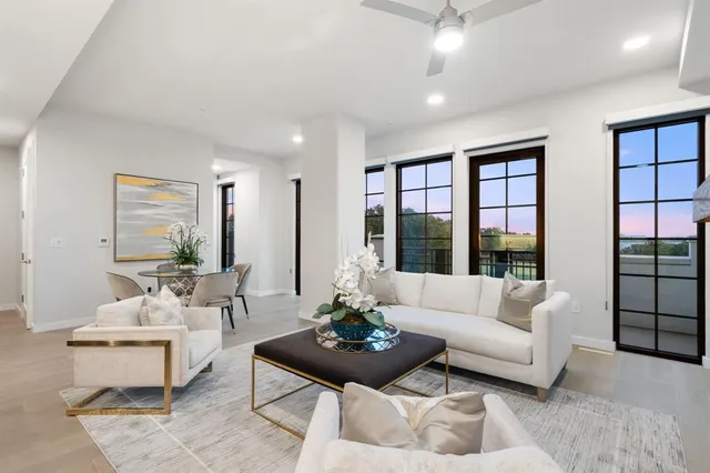 a dining room with furniture and window