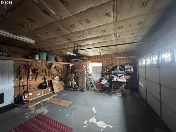 a view of multiple houses with city street