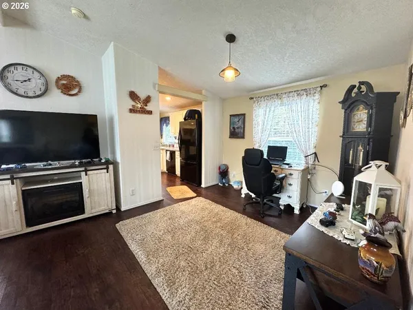 a bed room with furniture and a window