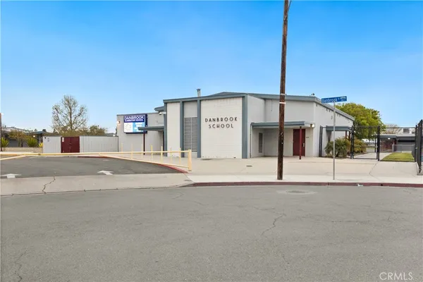 a view of a house with a street